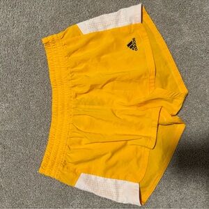 Adidas Gold Shorts with White Accents